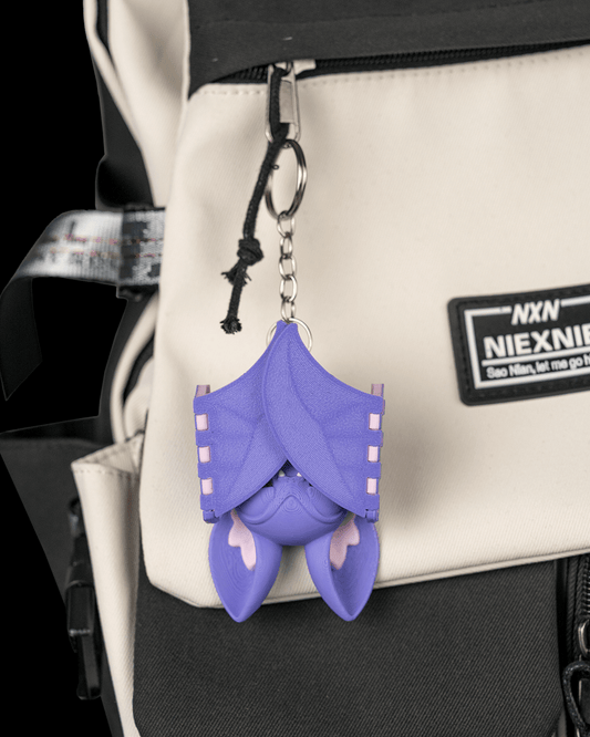 Buff Bat liliac musculos violet vedere spate cu aripi pliabile, inel breloc, fundal negru