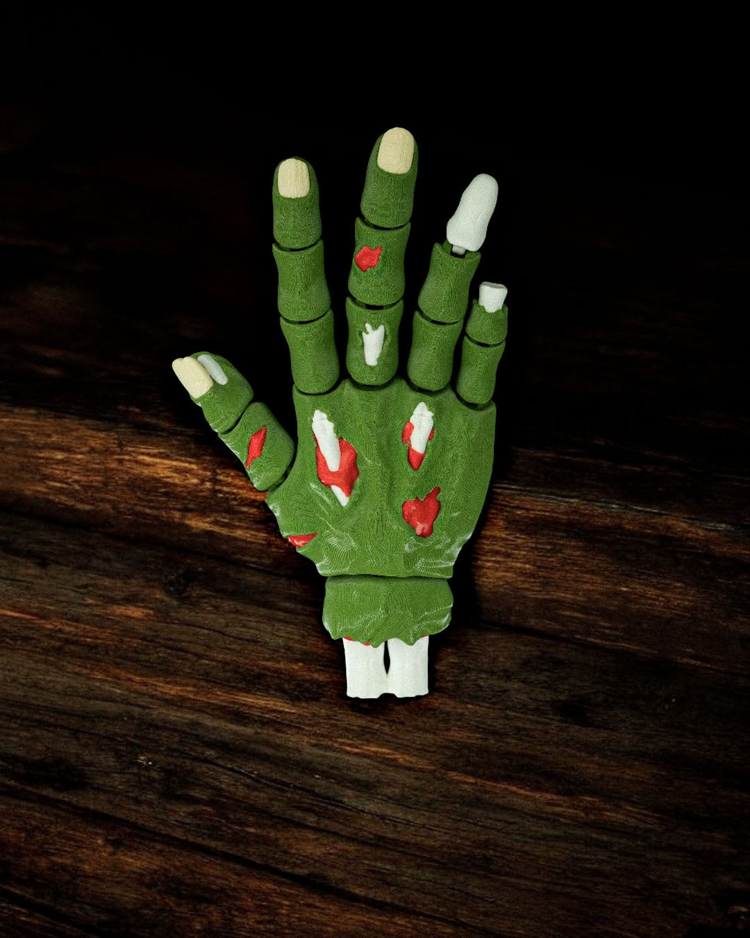 Handy Deadman mana zombie verde cu rani rosii, vedere palma, fundal alb