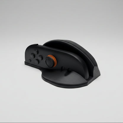 Atașament mouse Joy-Con Nintendo Switch 2 imprimat 3D – vedere frontală cu butoane ABXY și stick portocaliu