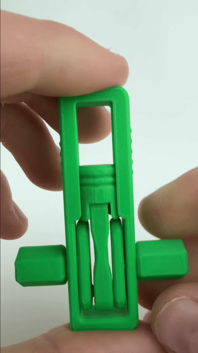 Ultimate Piston Fidget 3D - GIF animat mecanism piston in miscare tinut in doua maini, verde
