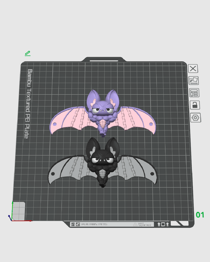 Buff Bat doua variante de culoare violet-roz si negru-gri pe placa de printare Bambu - vedere render slicer