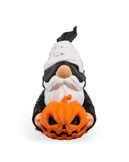 Gno-more gnom negru cu barbă albă și dovleac Jack-o-lantern portocaliu, vedere față