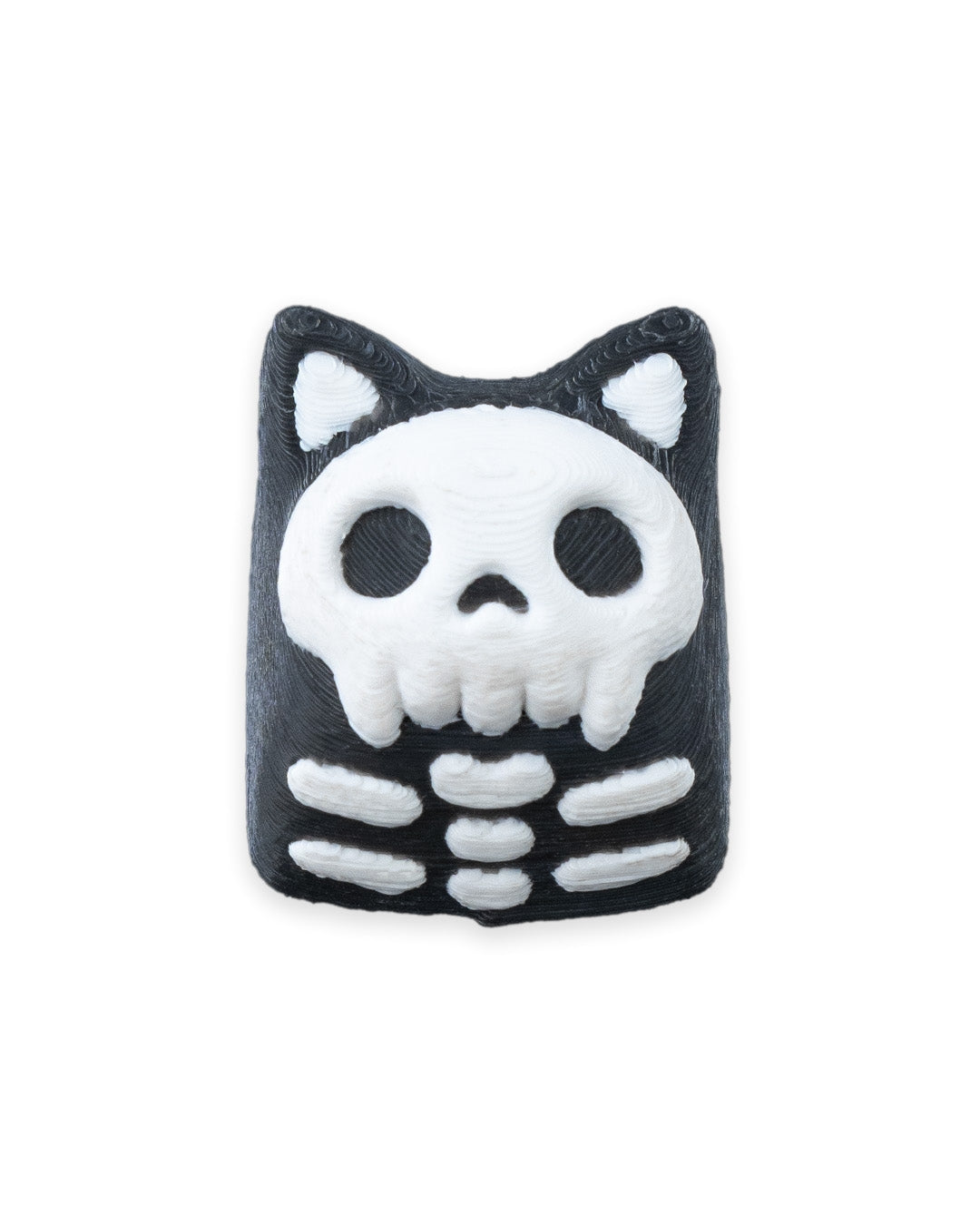 Skull Keycat - tastă mecanică pisică schelet bicolor negru-alb, vedere față pe fundal alb