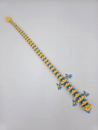 Figurină dragon flexibil 45cm imprimată 3D în galben și albastru – Praktik3D
